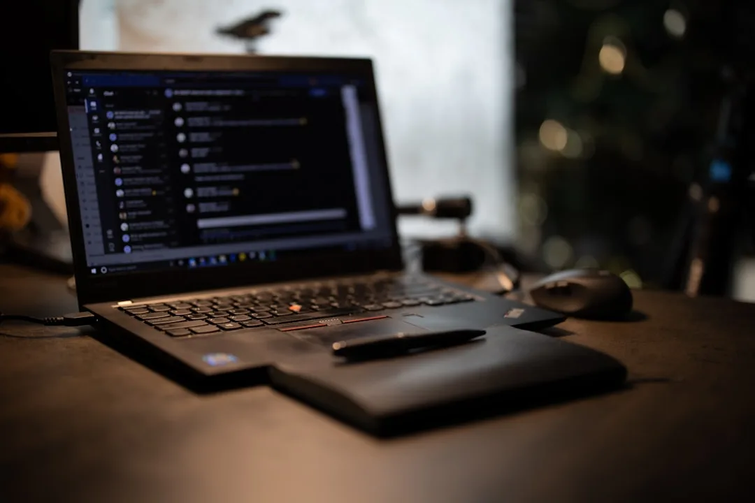 person working on computer with microsoft office